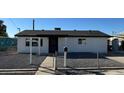 Newly renovated single story home with a gravel front yard at 236 S 2Nd St, Avondale, AZ 85323