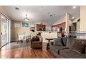 Bright dining area with hardwood floors and access to backyard at 3946 E Pollack St, Phoenix, AZ 85042