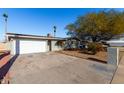 Front view of a single story home with a driveway at 4538 W Sierra St, Glendale, AZ 85304