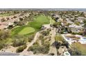 Golf course community overview, showcasing the lush green fairways and surrounding homes at 4602 E Monte Way, Phoenix, AZ 85044