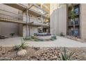 Community courtyard with fountain and landscaping at 5132 N 31St Way # 147, Phoenix, AZ 85016