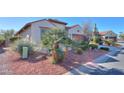 Landscaped yard with mature plants and cacti at 5491 W Pueblo Dr, Eloy, AZ 85131