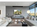 Modern living room boasts city views and comfy seating at 7180 E Kierland Blvd # 1116, Scottsdale, AZ 85254