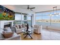 Bright living room with water views and fireplace at 140 E Rio Salado Pkwy # 506, Tempe, AZ 85281