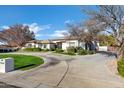 Spacious home with a long driveway and mature trees at 2536 E Wood Pl, Chandler, AZ 85249