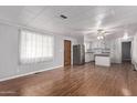 Open concept kitchen with island and stainless steel appliances at 2650 W Union Hills Dr # 352, Phoenix, AZ 85027