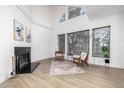 Bright living room with fireplace and high ceilings at 8829 S 51St St # 3, Phoenix, AZ 85044