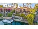 Stunning waterfront property with a pool and access to a canal at 10489 N 99Th St, Scottsdale, AZ 85258