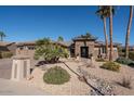 Single-story home with stone accents and a three-car garage at 19941 N Summer Dream Dr, Surprise, AZ 85374