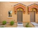 Townhome entry with double doors and desert landscaping at 2150 W Alameda Rd # 1251, Phoenix, AZ 85085