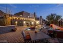 Outdoor dining area with a view of the pool and mountains at 2208 E Belmont Ave, Phoenix, AZ 85020