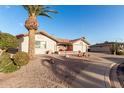 Front yard view of a single-story house with palm trees at 2545 S Zinnia --, Mesa, AZ 85209