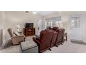 Relaxing living room featuring comfortable recliners and a TV at 2545 S Zinnia --, Mesa, AZ 85209