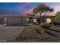 One-story home with a three-car garage and landscaped front yard at 29306 N 70Th Way, Scottsdale, AZ 85266