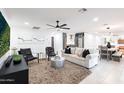 Open concept living room and dining area with stylish decor at 2942 N 81St Pl, Scottsdale, AZ 85251