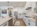 Modern kitchen with stainless steel appliances and white cabinetry at 39024 N 6Th Dr, Phoenix, AZ 85086