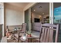 Private balcony with seating and partial view of living area at 4134 E Pinto Dr, Gilbert, AZ 85296