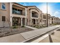 Row of townhomes showcasing architectural details and landscaping at 4134 E Pinto Dr, Gilbert, AZ 85296