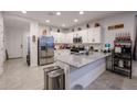 Modern kitchen featuring granite countertops and stainless steel appliances at 4524 S 127Th Ln, Avondale, AZ 85323