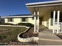 House exterior showcasing a front porch and landscaping at 5708 W Belmont Ave, Glendale, AZ 85301