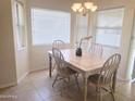 Charming dining area with a table and four chairs at 5830 E Mckellips Rd # 101, Mesa, AZ 85215