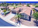 Beautiful aerial view of a single-Gathering home on a golf course with desert landscaping at 6616 S Bridal Vail Dr, Gilbert, AZ 85298