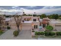 Aerial view of a two-story home with a Spanish-style roofline at 7756 E San Miguel Ave, Scottsdale, AZ 85250