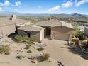 Luxury home with a large driveway and mountain views at 10721 N Skyline Dr, Fountain Hills, AZ 85268