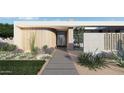 Mid-century modern home with landscaped yard and walkway at 7034 E Paradise Dr, Scottsdale, AZ 85254