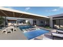 Luxury pool with patio furniture and covered seating area at 7034 E Paradise Dr, Scottsdale, AZ 85254