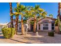 Front view of a two-story home with lush landscaping at 1269 N Layman St, Gilbert, AZ 85233