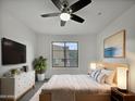 Main bedroom with large window, ceiling fan, and dresser at 2401 E Rio Salado Pkwy # 1038, Tempe, AZ 85288