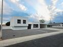 Remodeled single-story home with a modern facade and gravel driveway at 3447 W Dailey St, Phoenix, AZ 85053