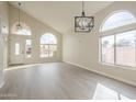 Bright and spacious living room with high ceilings and hardwood floors at 532 N Bell Dr, Chandler, AZ 85225