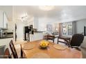 Modern kitchen with white cabinetry and black appliances at 5995 N 78Th St # 1015, Scottsdale, AZ 85250