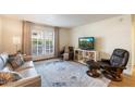 Bright living room featuring comfortable seating and wood floors at 5995 N 78Th St # 1015, Scottsdale, AZ 85250