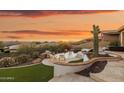 Stunning pool and patio area with mountain backdrop at 13645 E Columbine Dr, Scottsdale, AZ 85259