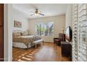 Bright bedroom with hardwood floors and plenty of natural light at 19550 N Grayhawk Dr # 1136, Scottsdale, AZ 85255