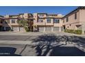 Exterior view of a two-story building with several units and parking at 20660 N 40Th St # 2140, Phoenix, AZ 85050