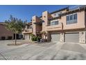 Two-story building with attached garages and landscaping at 20660 N 40Th St # 2140, Phoenix, AZ 85050