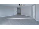 Open living area with light gray walls and wood-look flooring at 2191 S Descanso Rd, Apache Junction, AZ 85119