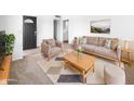 Bright living room featuring neutral color palette and comfy furniture at 25 S Sahuaro Dr, Gilbert, AZ 85233