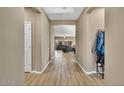 Bright and spacious entryway with tile flooring leading to the living area at 26119 W Wahalla Ln, Buckeye, AZ 85396