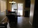 Dining area with table and chairs, adjacent to kitchen at 2845 W Angela N Dr, Phoenix, AZ 85053