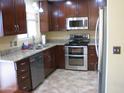 Kitchen with stainless steel appliances and granite countertops at 2845 W Angela N Dr, Phoenix, AZ 85053