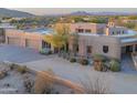 Stunning desert home with stucco exterior, multi-car garage, and desert landscaping at 30600 N Pima Rd # 33, Scottsdale, AZ 85266