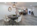 Elegant dining area with a round table and modern chairs at 3402 E Sunnyside Dr, Phoenix, AZ 85028