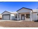 Newly built home featuring a clean, modern design and a two-car garage at 4229 N 32Nd Ave, Phoenix, AZ 85017