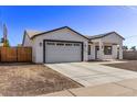 Charming single story home with a white exterior and a spacious driveway at 4229 N 32Nd Ave, Phoenix, AZ 85017