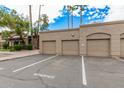 Garage for resident parking in a community of homes with a reserved parking space at 7009 E Acoma Dr # 1004, Scottsdale, AZ 85254